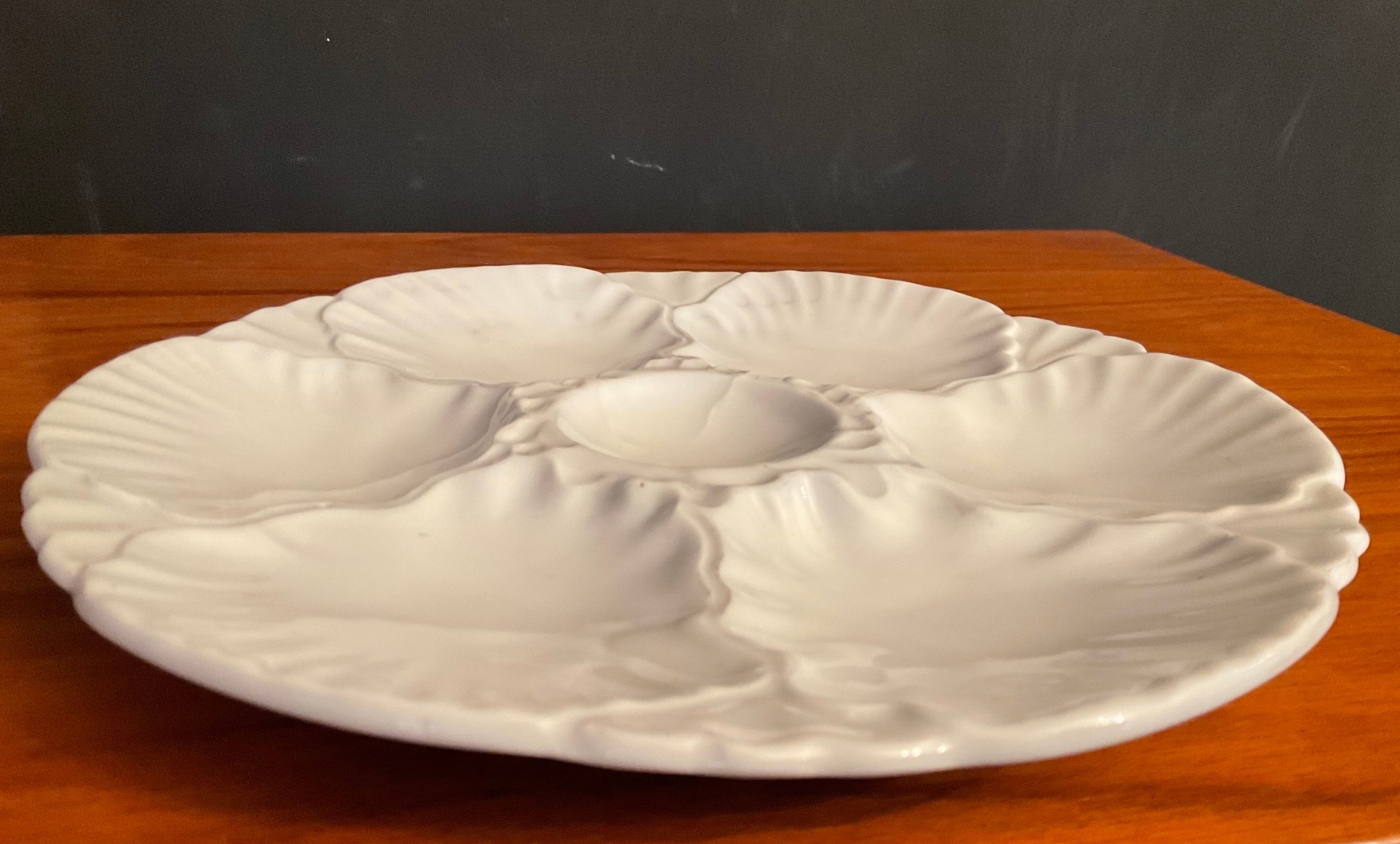 Series of 6 porcelain oyster plates
