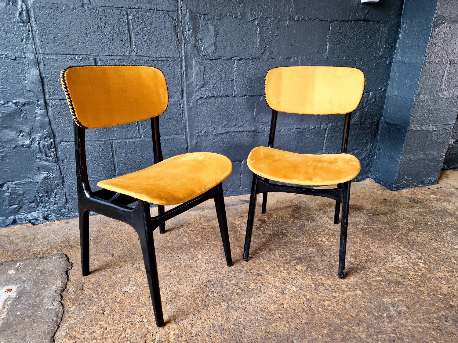 2 vintage chairs in black lacquered wood and yellow/mustard fabric, 1960