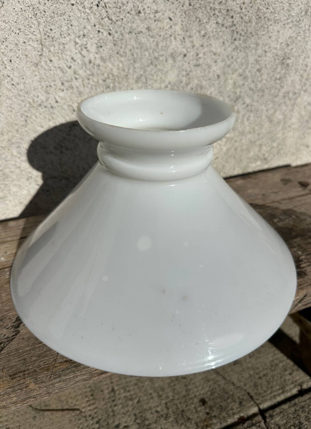 Old white abat-jour in opaline