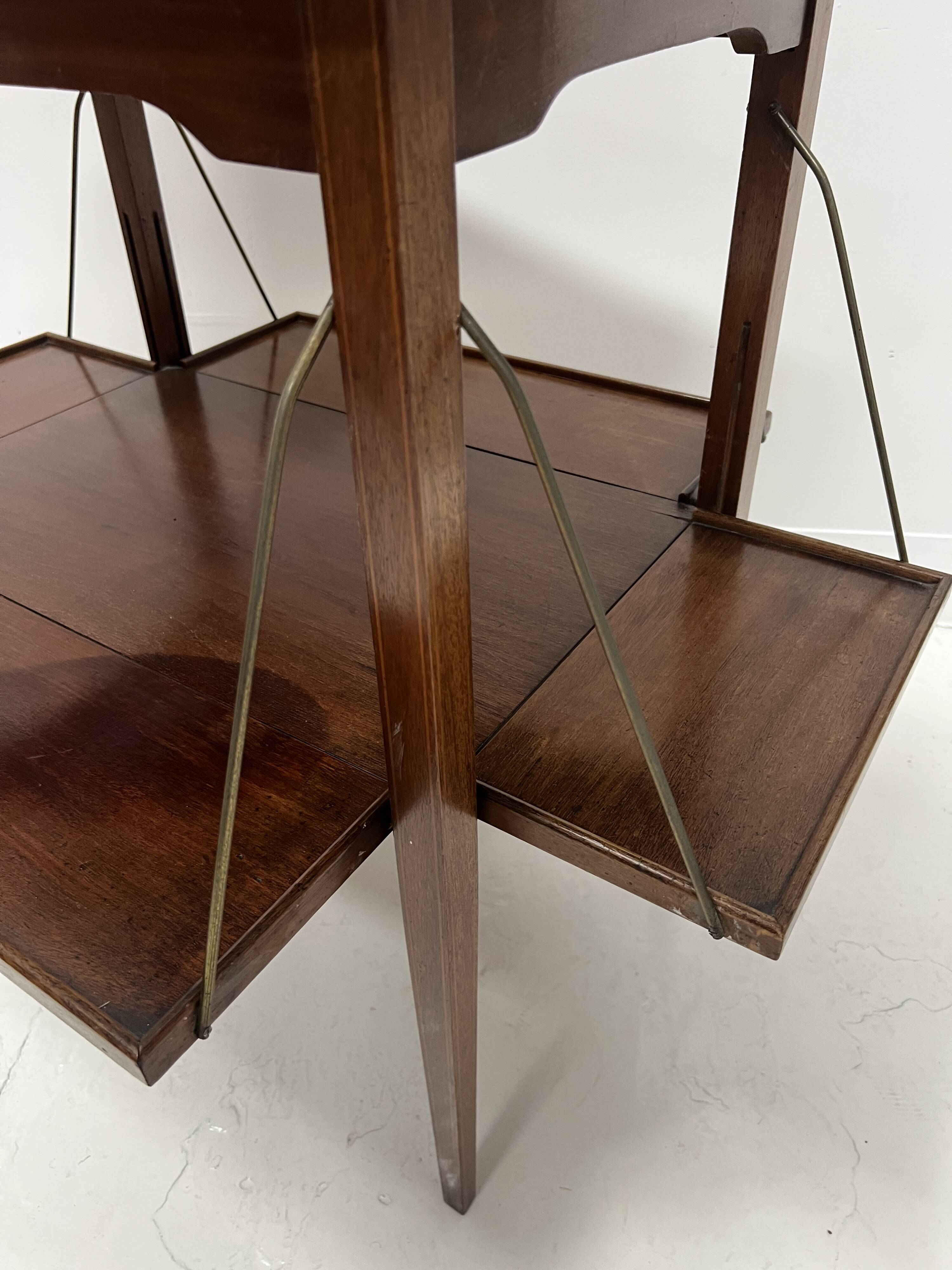 Mahogany serving table with marquetry inlay decoration, 20th century.