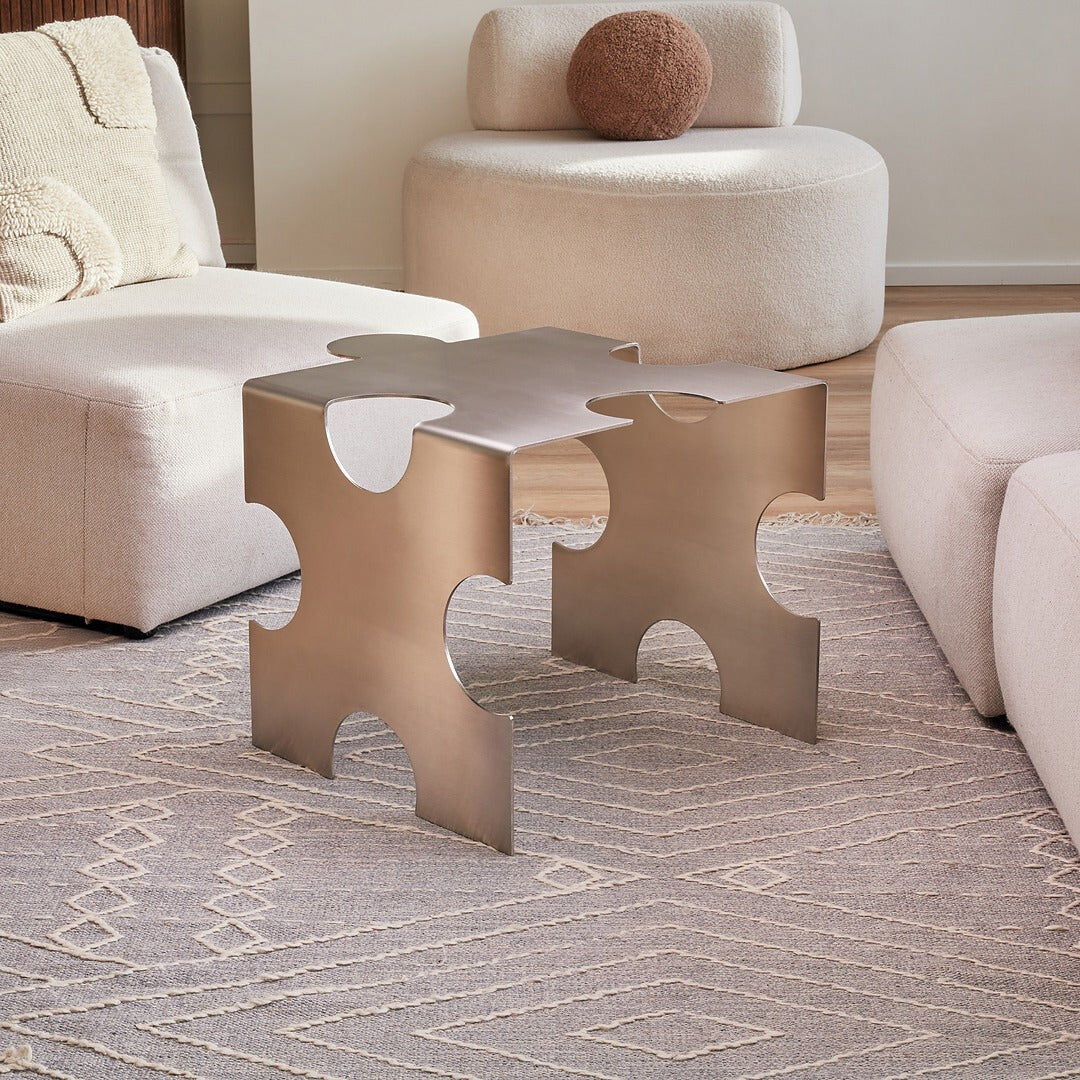 Puzzle - table basse sculpturale en acier inoxydable par Veliento