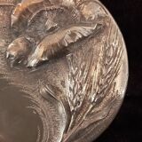 Round Art Nouveau pewter box with floral motifs