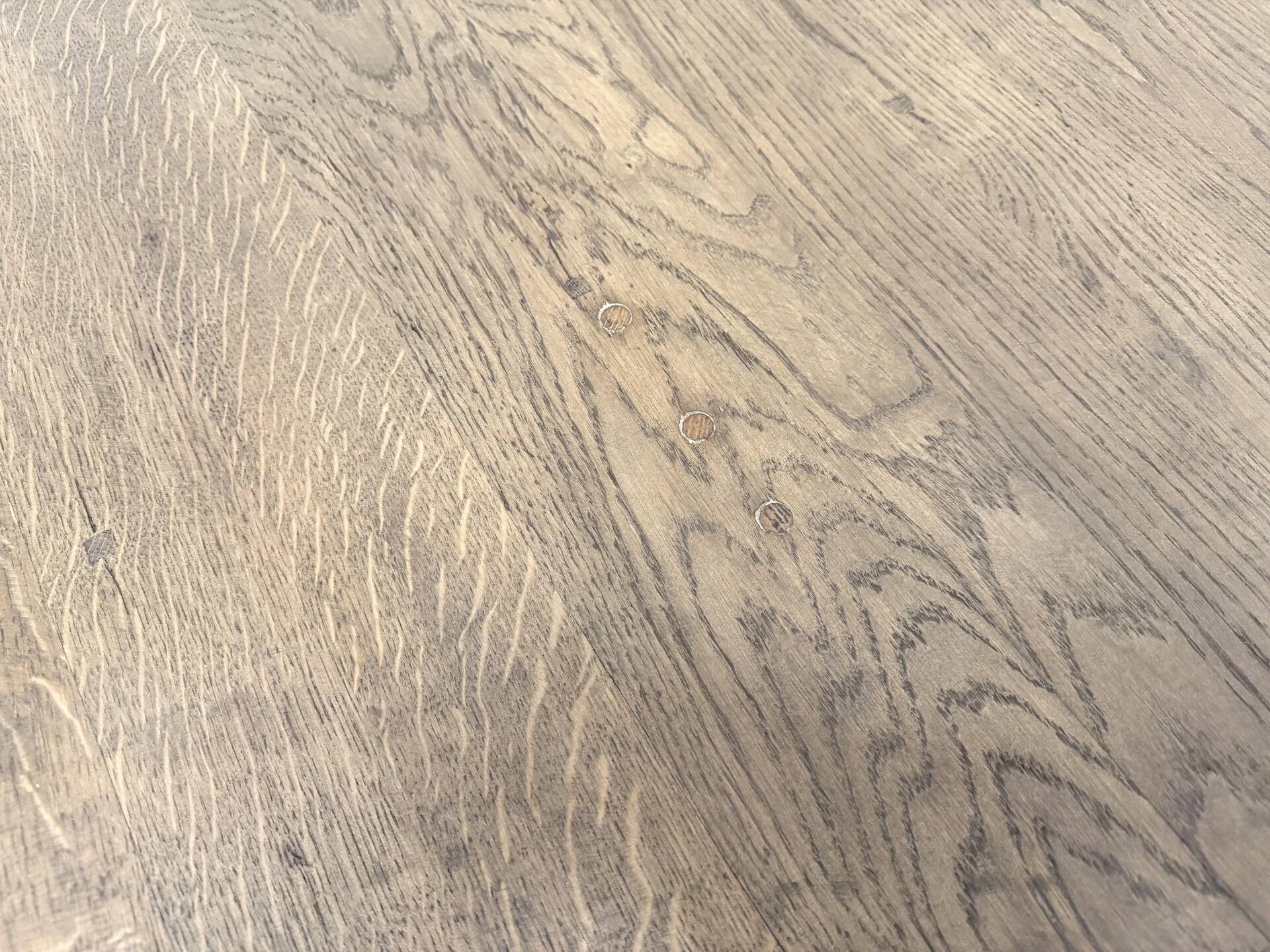 Oval table with T-shaped legs, solid oak, student woodworking project.