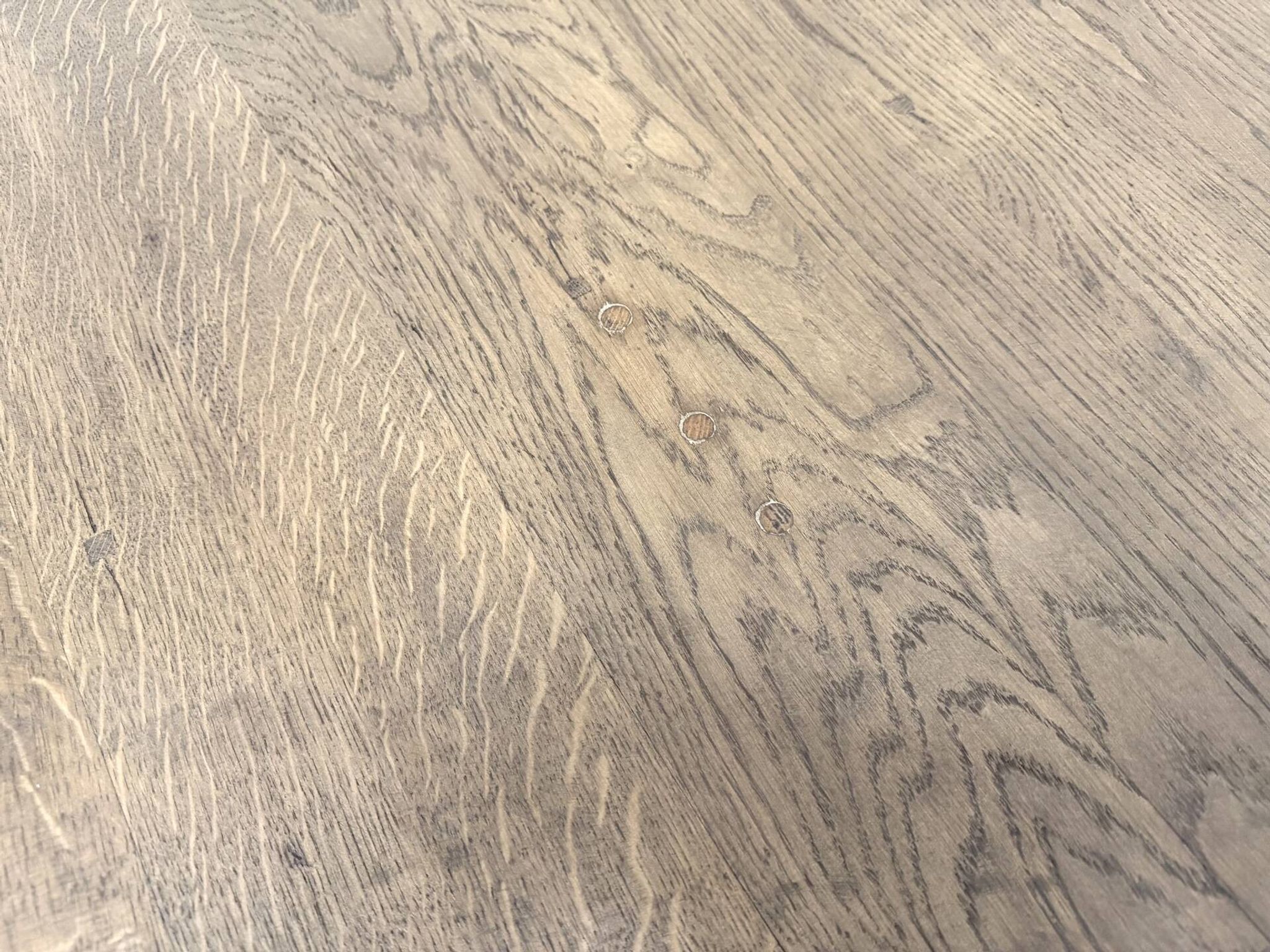 Oval table with T-shaped legs, solid oak, student woodworking project.