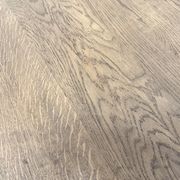 Oval table with T-shaped legs, solid oak, student woodworking project.