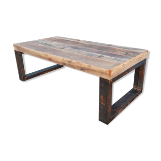 Industrial coffee table with wooden top and metal legs