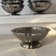 Stainless steel ice cream bowls for one scoop.