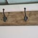 wooden school coat rack and iron hooks