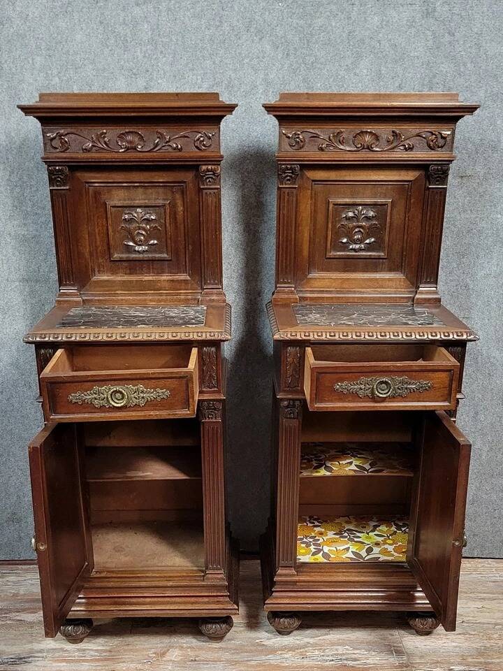 Pair of Renaissance style bedside tables in carved walnut, 19th century