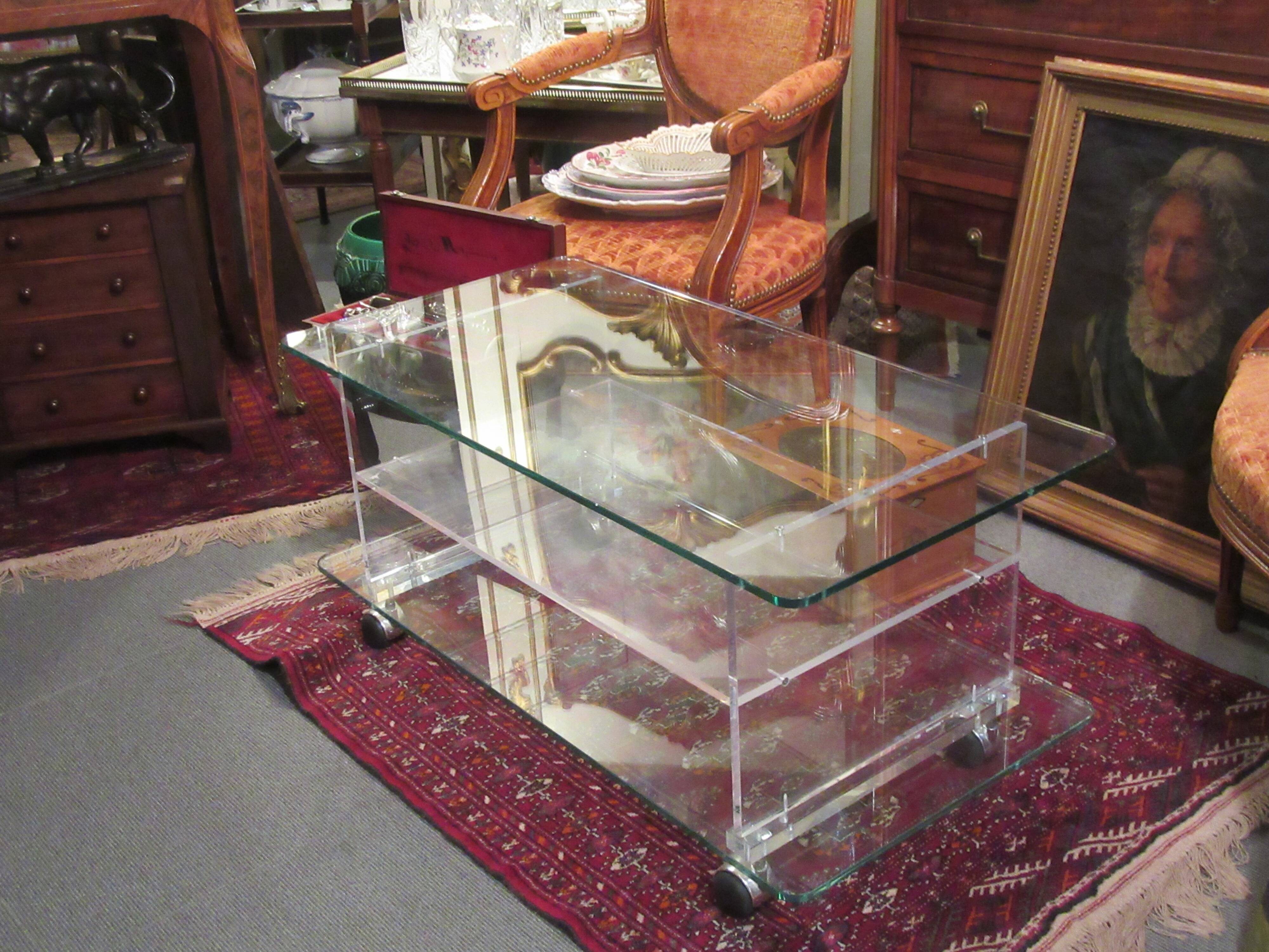 vintage glass coffee table with plexiglass legs