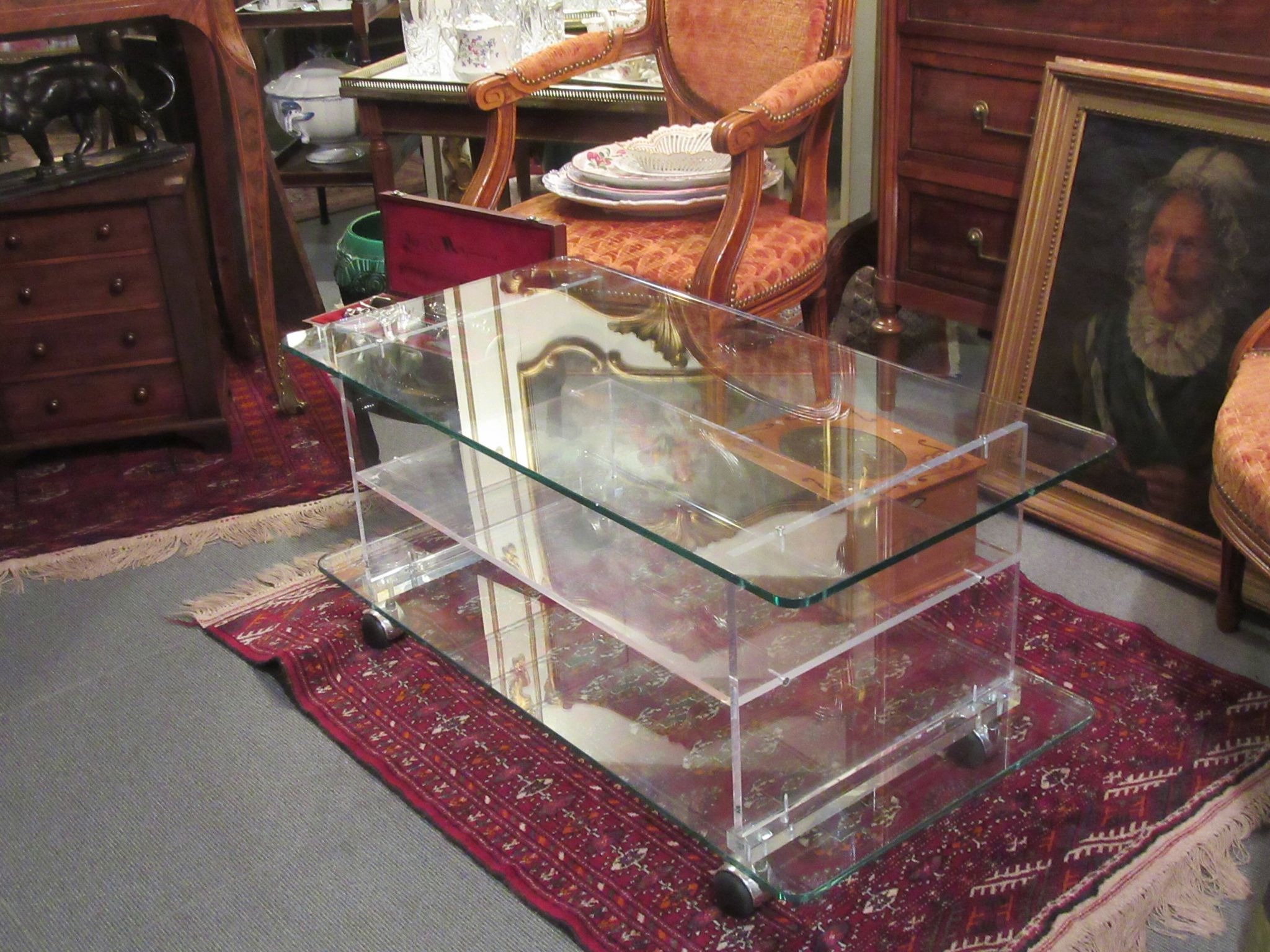 vintage glass coffee table with plexiglass legs