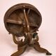 Table ronde Empire – acajou avec incrustations et pieds griffes