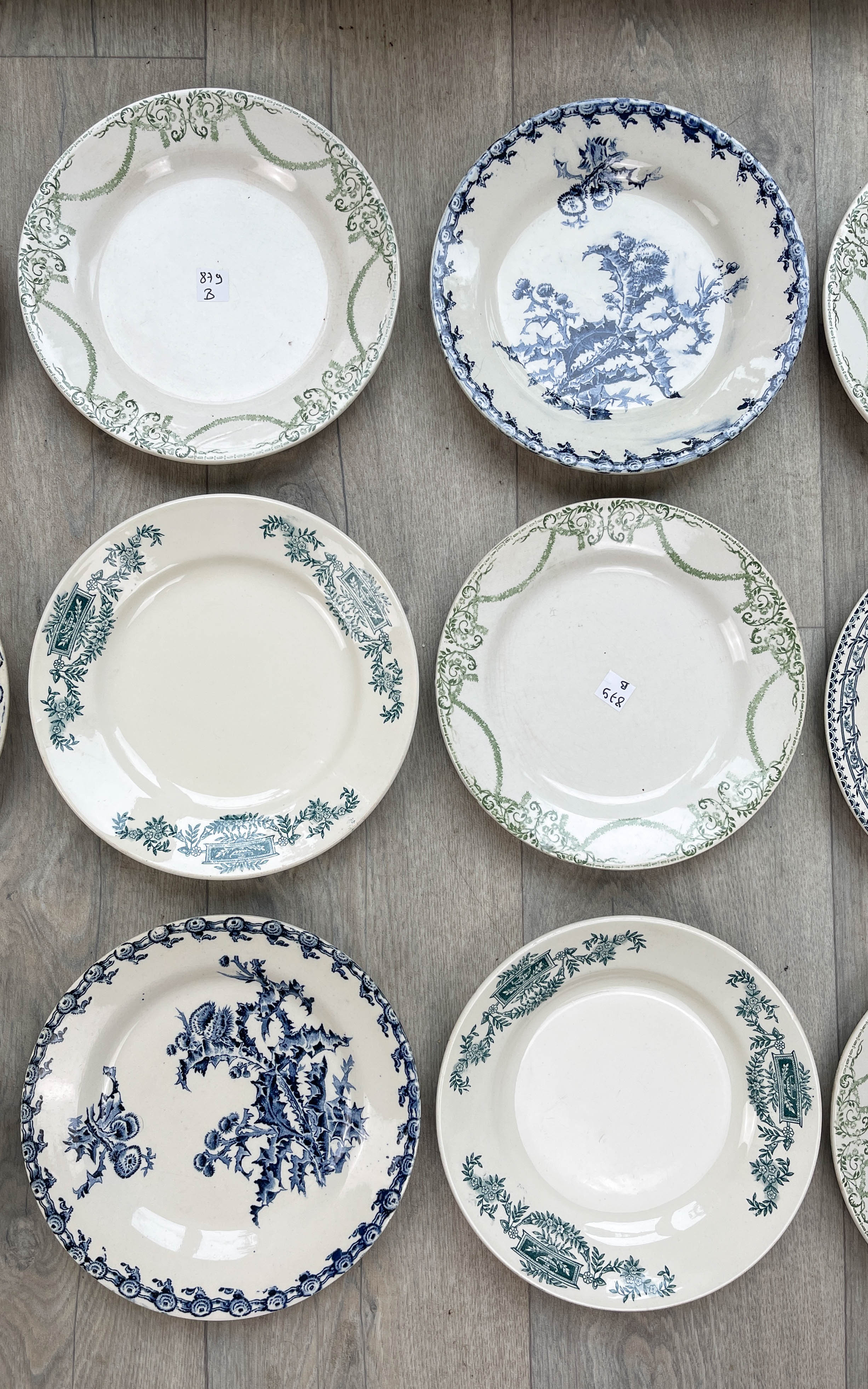 6 green and blue mismatched iron earth plates