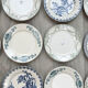 6 green and blue mismatched iron earth plates