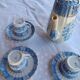 Old coffee service Lunéville with blue lace decoration.