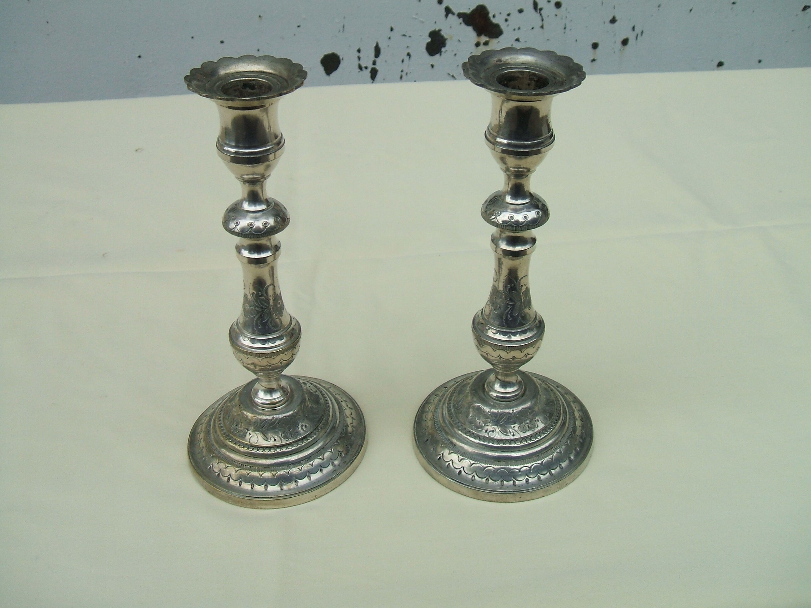 Pair of silver bronze candle holders