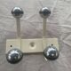 Industrial wall coat rack two hooks in white lacquered metal and vintage silver 1970