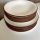 Set of 6 flat plates and 6 hollows in enamelled earth KMK 1965