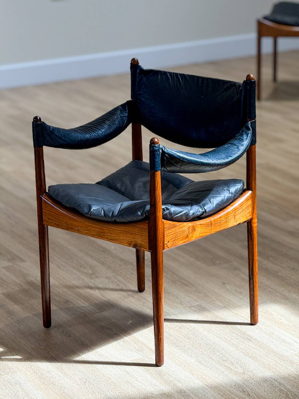 Extendable dining room table and chairs (by Kristian Solmer Vedel)