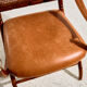 Walnut armchair with bamboo design