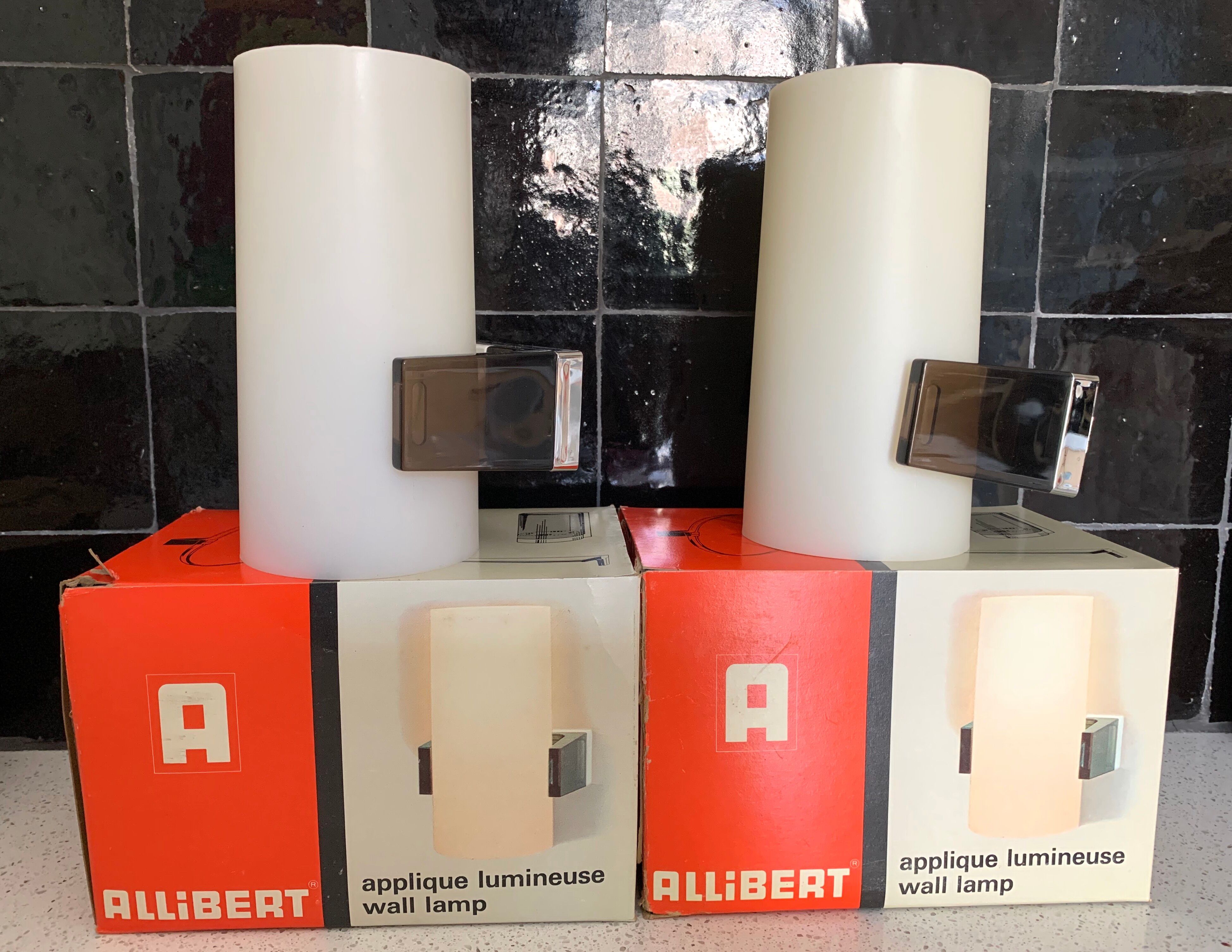 Pair of Allibert wall lamps