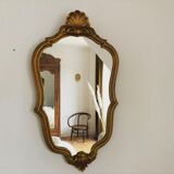Old mirror in gilded wood