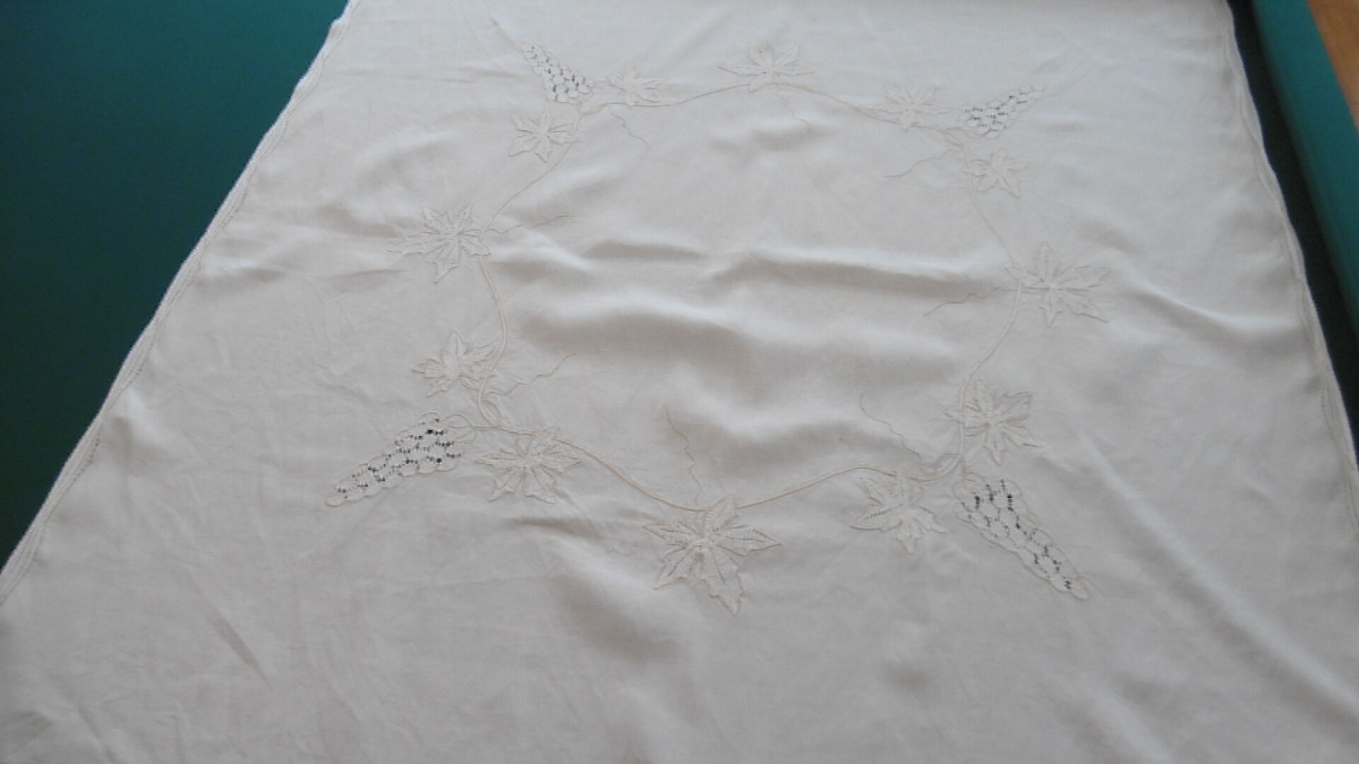 Hand-embroidered linen teacloth or overnappe
