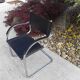 Cantilever skaï and chrome armchair