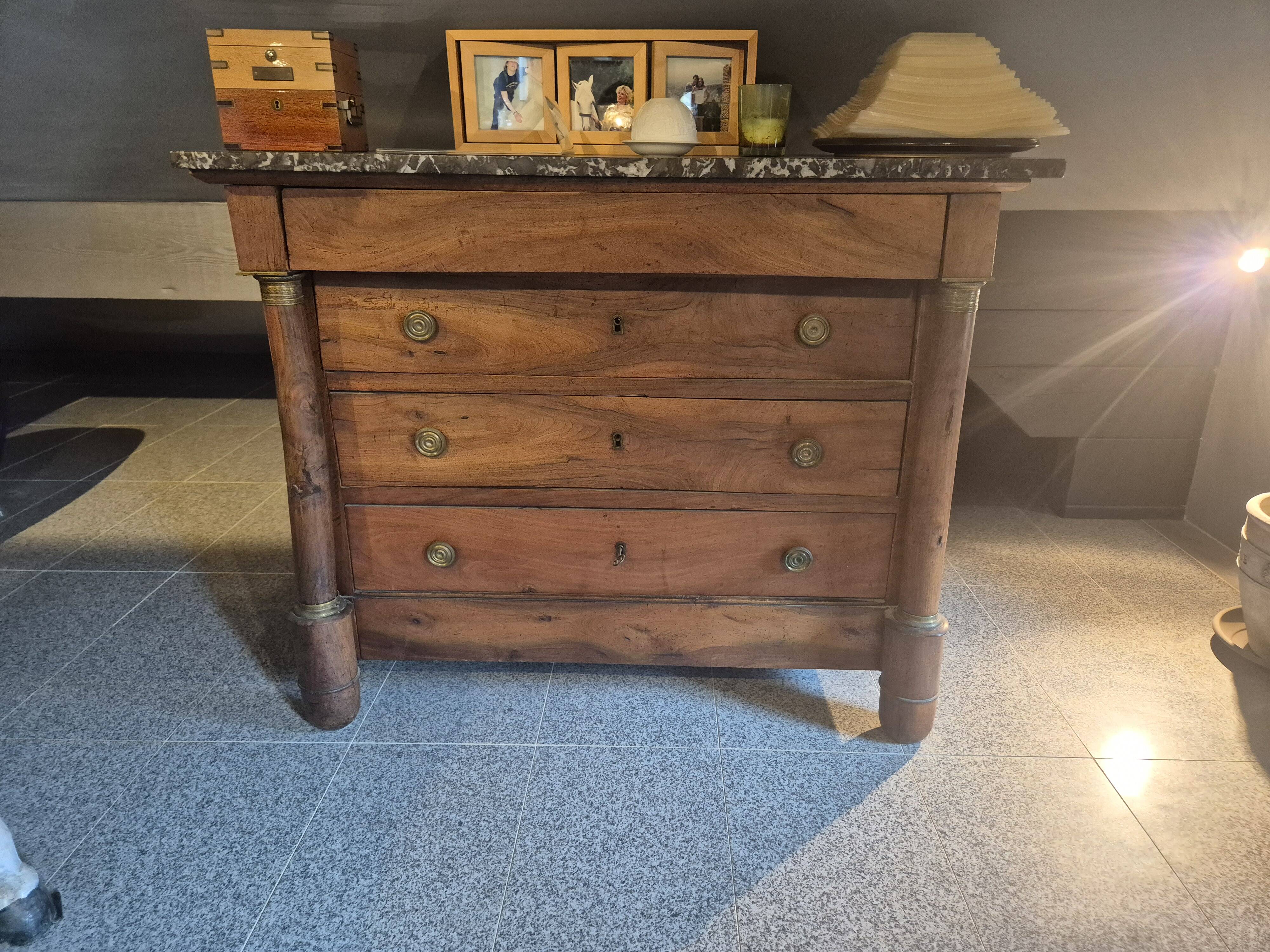 Empire period walnut chest of drawers