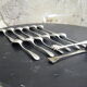 Set of twelve teaspoons and a sugar tongs