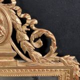 Louis XVI style mirror in gilded wood