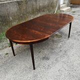 Table ronde en palissandre à rallonges