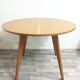 Table ronde pieds compas, 1960