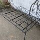Metal folding bed, wrought iron bench
