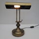 Old aged brass articulated desk lamp