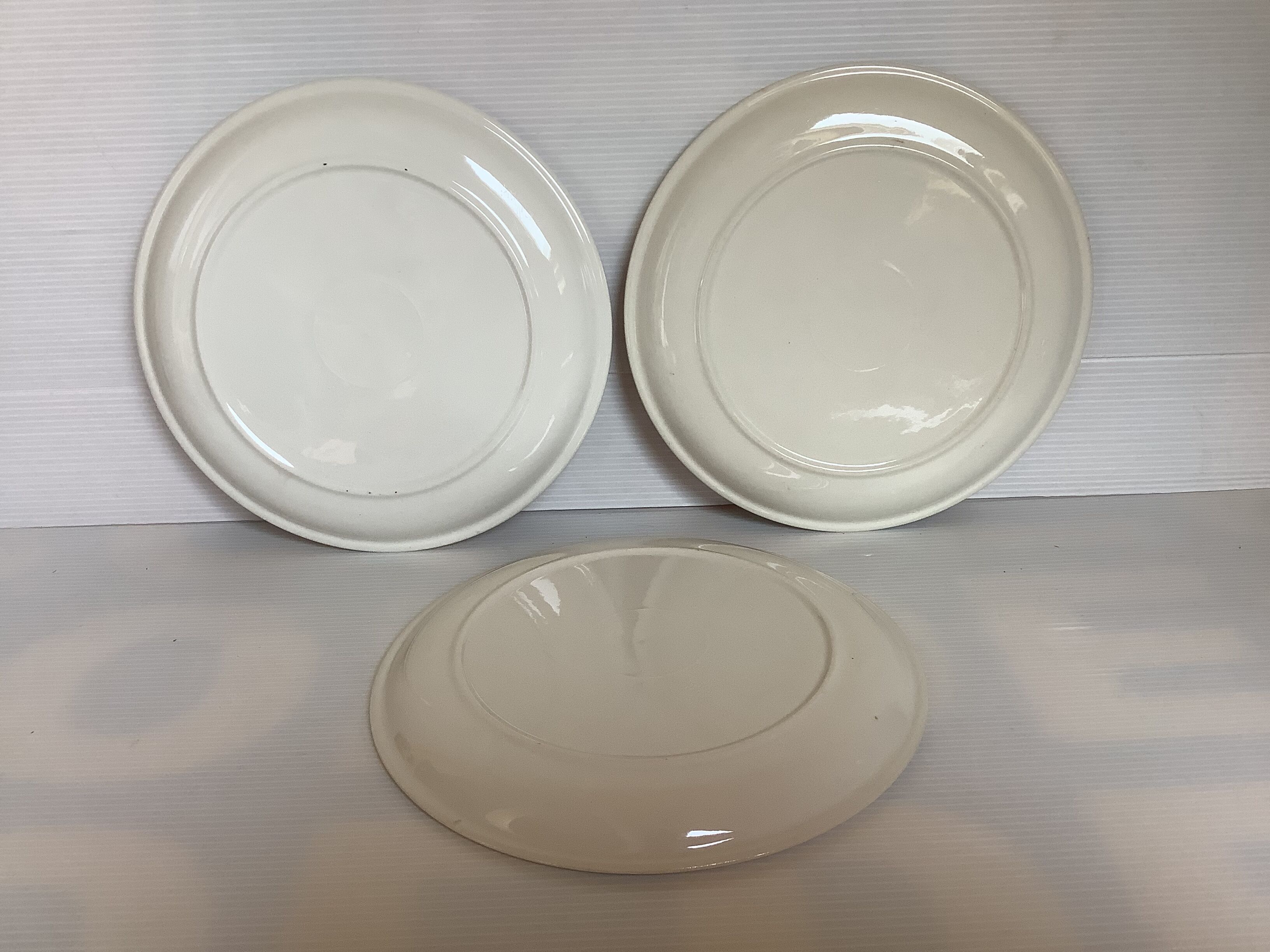 Six vintage floral cheese plates.
