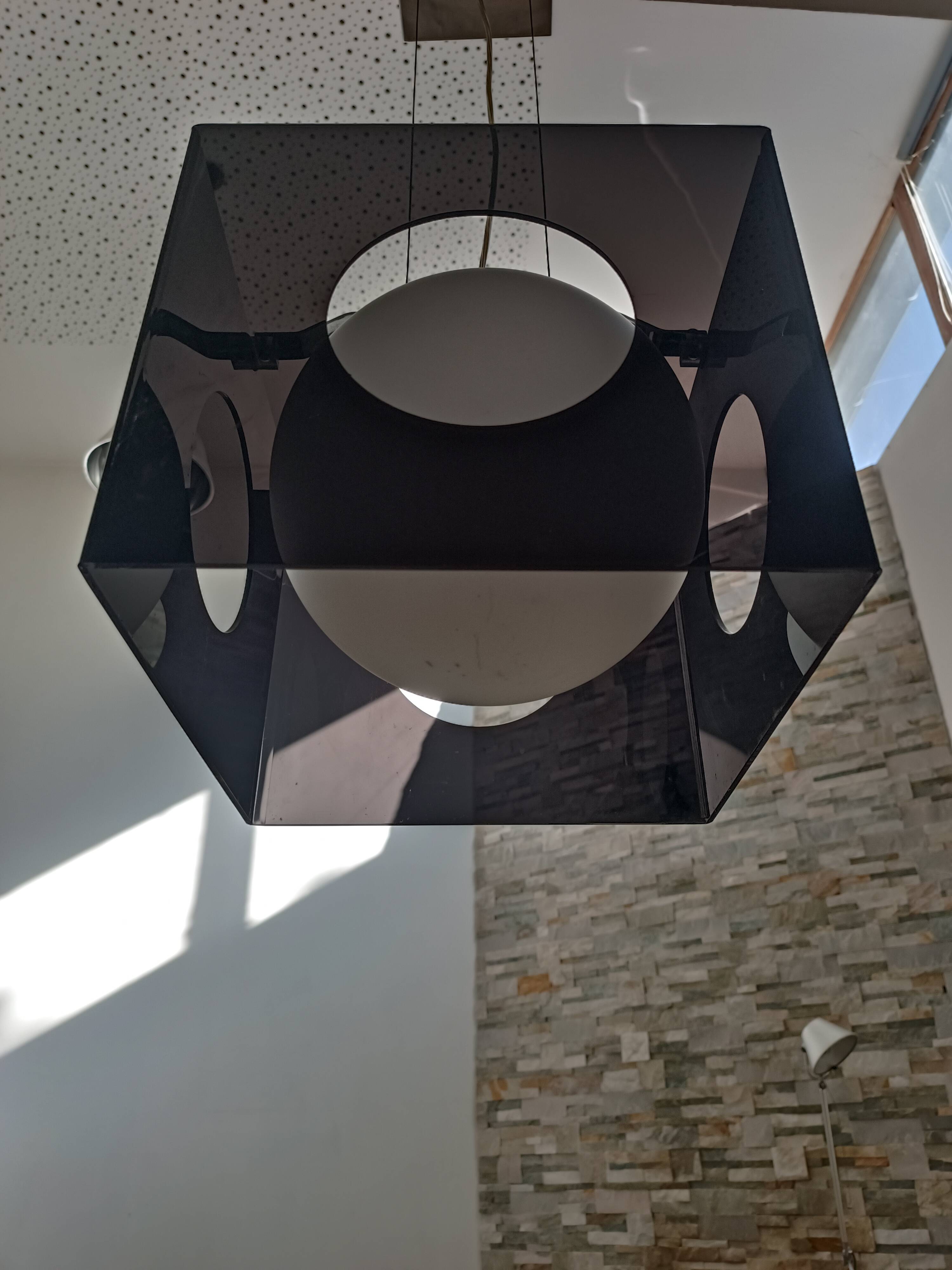 Suspended lamp design in smoked plexiglass from the 1990s.