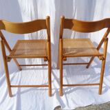 Duo of canned folding chairs