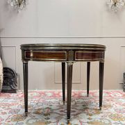 Half-moon table in mahogany from the Louis XVI period, 18th century.