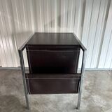 Vintage design magazine rack in chrome metal