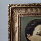 Oil on canvas portrait in an antique gilded wooden frame.