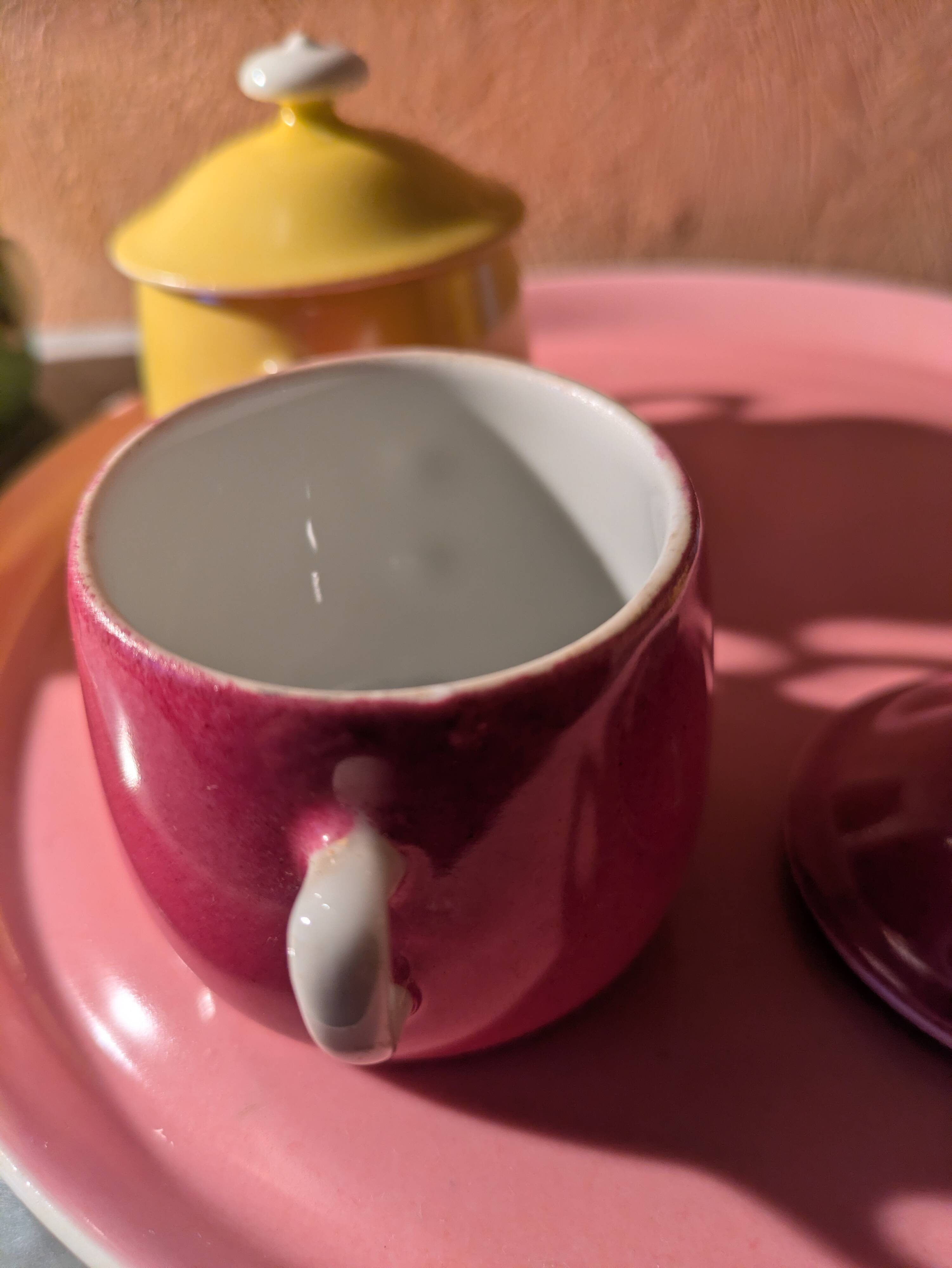 6 small porcelain cream pots from Limoges with a tray.