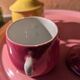 6 small porcelain cream pots from Limoges with a tray.