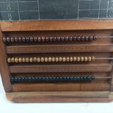 Old billiard abacus with branded slate