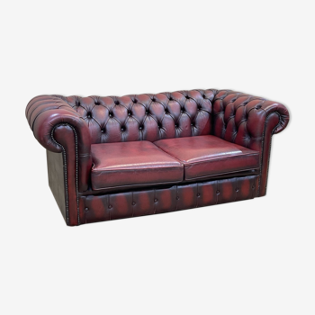 Chesterfield 2-seater sofa in red leather from the 1980s
