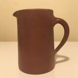 Small pitcher in patinated sandstone