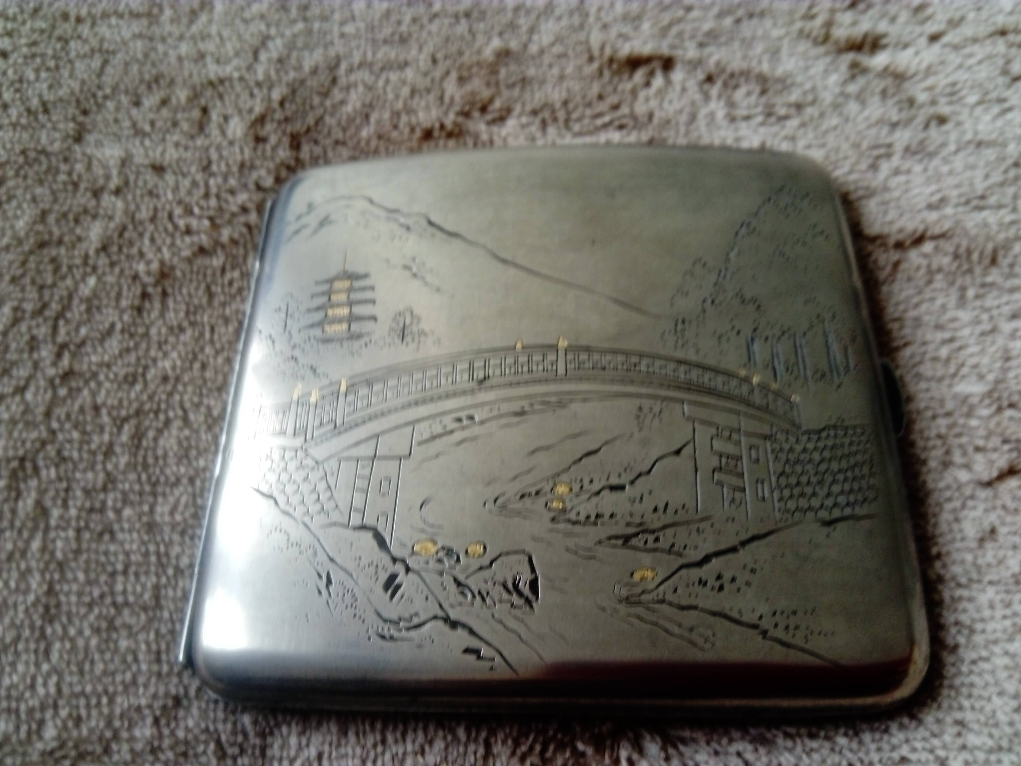 Old sterling silver cigarette case with Japanese decor