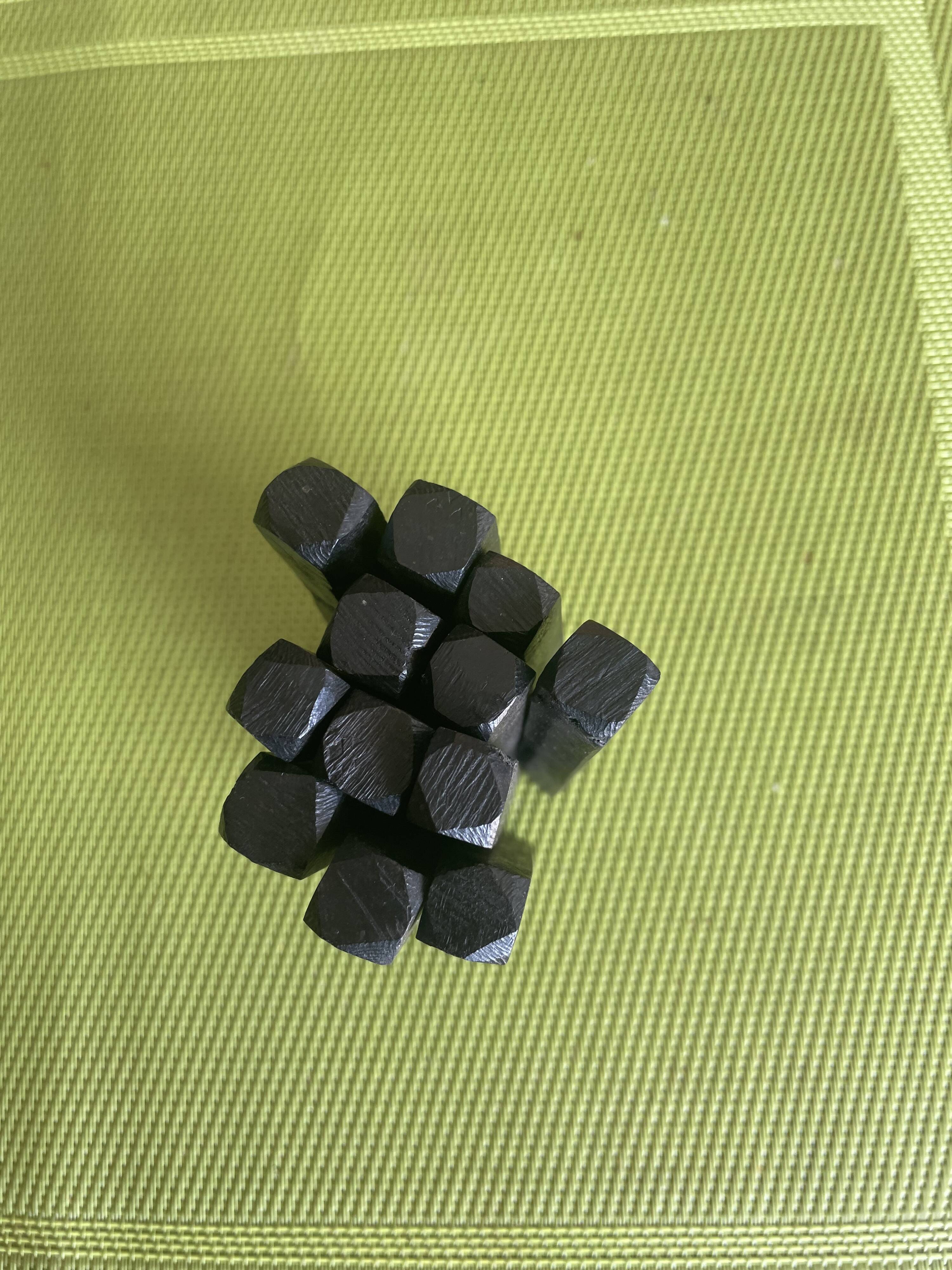 Set of 12 vintage ebony knife rests