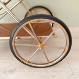 Rolling trolley in gold metal