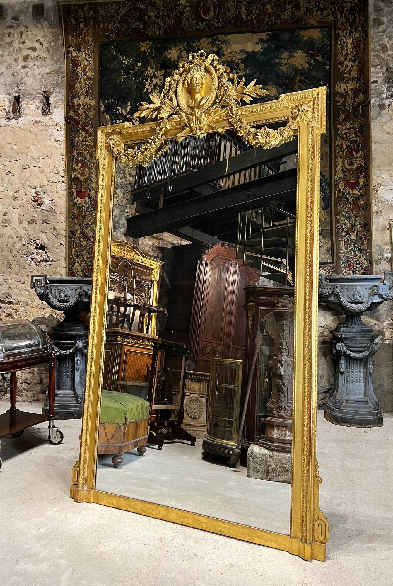 Monumental mirror Napoleon III in gilded wood with the profile of Apollo